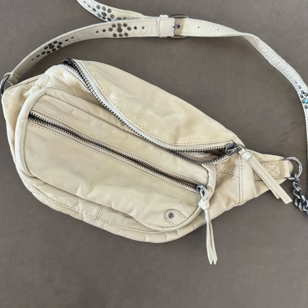 Free People embellished sling bag.